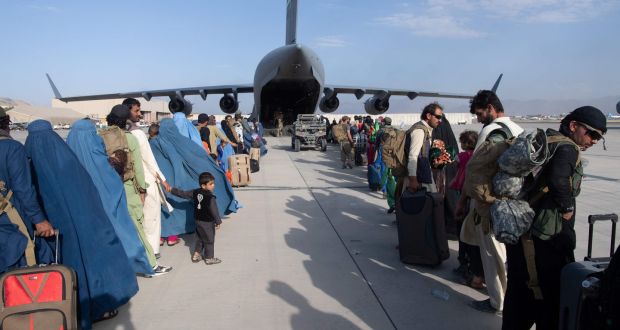 Passengers getting aboard a US Air Force C-17 Globemaster III in support of the Afghanistan evacuation. Photograph: Donald R Allen/US Air Force/AFP via Getty