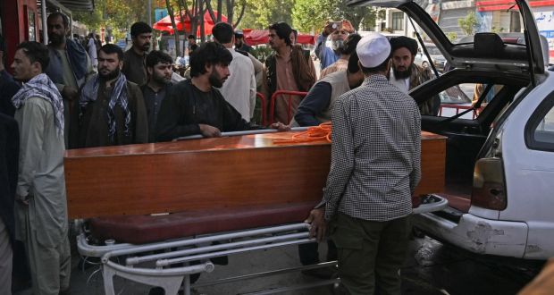 The coffin of a victim of the twin suicide bombs, which killed scores of people including 13 US troops outside Kabul airport on Thursday. Photograph: Aamir Qureshi/AFP/Getty Images