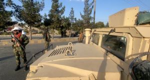 Taliban patrols outside Hamid Karzai International Airport in Kabul, Afghanistan. Photograph: EPA/STRINGER