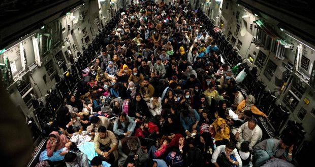 Civilians being evacuated by the US miluitary on board a plane at Kabul airport on August 19th. Photograph:  Brandon Cribelar/US Central Command Public Affairs/AFP via Getty Images