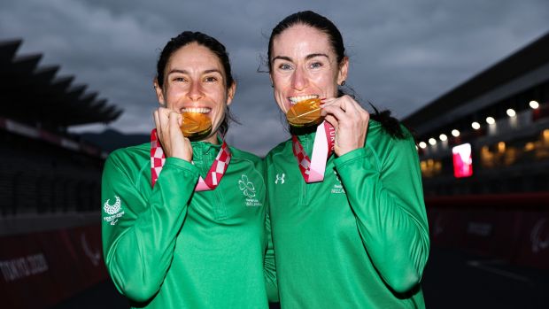 Katie-George Dunlevy and Eve McCrystal celebrate with their gold medals in Tokyo. Photograph: Tommy Dickson/Inpho