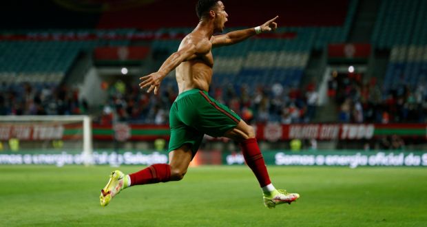 Cristiano Ronaldo celebreates after scoring his second goal in stoppage time to secure a win for Portugal over Ireland. Photograph: Antonio Cotrim/EPA