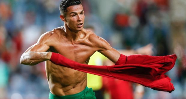  Cristiano Ronaldo takes off his shirt after scoring his second goal in the World Cup qualifier against Ireland. Photograph: Antonio Cotrim/EPA