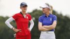 Nelly Korda of Team USA and Madelene Sagström of Team Europe during the fourballs match on day one of the Solheim Cup at the Inverness Club in Toledo, Ohio on Saturday. Photograph: Maddie Meyer/Getty Images
