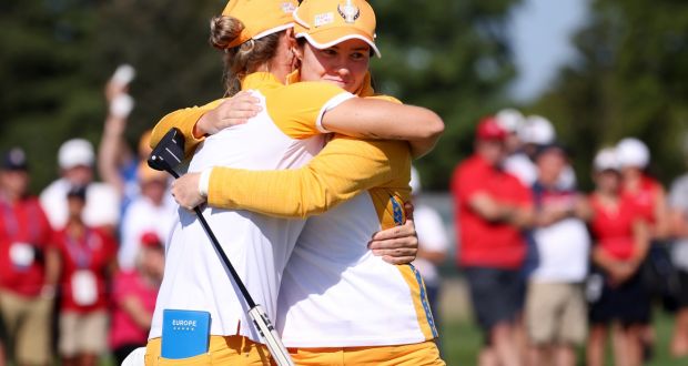  Mel Reid  and Leona Maguire celebrate winning the   14th hole of their  foursomes match on day two of the Solheim Cup at the Inverness Club. Photograph:  Gregory Shamus/Getty Images