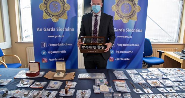 Insp Jason Miley of Crumlin station with some of the items the force hopes to return to rightful owners. Photograph: Collins