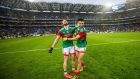 Mayo’s Pédraig O’Hora and Enda Hession celebrate at the final whistle after beating Dublin in the All-Ireland semi-final. Photo: James Crombie/Inpho