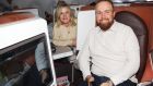 Shane Lowry and his wife Wendy Honner on the plane ready to head for Milwaukee and then the Ryder Cup. Photograph: Andrew Redington/Getty