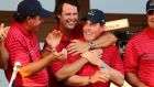   Captain Paul Azinger (centre)  of the USA team celebrates with Phil Mickelson (left) and Justin Leonard   after winning the Ryder Cup in 2008. Photograph: Andrew Redington/Getty Images