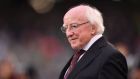 President Michael D Higgins: By what ancient immutable rule is our presidential office – prized  for its lofty position above politics – obliged to respond immediately to any controversy, especially when abroad? Photograph: Getty Images