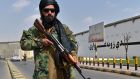 A Taliban fighter near Zanbaq Square in Kabul. Photograph:  Wakil Kohsar/AFP via Getty Images
