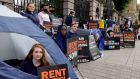   USI president Claire Austick  protests with students at the Dáil   to put pressure on the Government to take urgent action over   accommodation shortages. Photograph:  Alan Betson