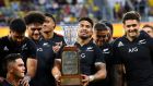 New Zealand captain Ardie Savea celebrates winning Freedom Cup with teammates after the Rugby Championship match against South Africa in Townsville on Saturday. Photograph: Patrick Hamilton/AFP via Getty Images