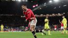 Cristiano Ronaldo of Manchester United celebrates scoring a late winner in his side’s Uefa Champions League clash with Villarreal. Photograph: David S. Bustamante/Getty Images