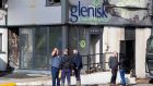 Workers at the Glenisk factory in Killeigh, Tullamore Co Offaly earlier this week after it was extensively damaged in a fire. Photograph: Collins 