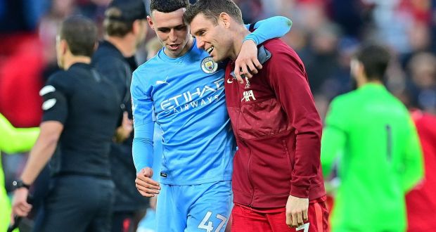 Manchester City’s Phil Foden with James Milner after the Premier League draw with Liverpool. Photo: Paul Ellis/AFP via Getty Images