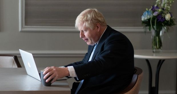  Boris Johnson  preparing his speech  in his hotel room on the third day of the annual Conservative Party conference in Manchester. Photograph:  Stefan Rousseau/pool/AFP via Getty Images