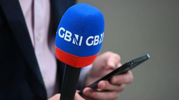 A reporter for GB News in London.