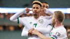 Callum Robinson celebrates scoring one of his two goals  with Adam Idah and Daryl Horgan during the World Cup qualifier against Azerbaijan in Baku. Photograph: Laszlo Geczo/Inpho