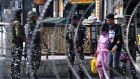 Indian paramilitary troops stand guard in Srinagar after suspected militants shot dead five soldiers in Indian-administered Kashmir. Photograph:  Tauseef Mustafa/AFP via Getty Images