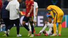 Raphael Varane of France sits on the ground after suffering an injury in the  Uefa Nations League Final against Spain at San Siro Stadium in Milan, Italy. Photograph: Mike Hewitt/Getty Images
