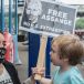 Stella Morris partner of Julian Assange with one of their children at the quay as supporters of Julian Assange hold a protest along the river Thames in 2021. Photograph: Guy Smallman/Getty Images