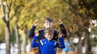 Brothers Luke (7) and James McCauley (11) from Drumcondra hunting for conkers. Photograph: Tom Honan