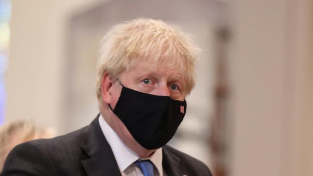 Clearly, nobody showed Boris the memo about ‘no emblems in the workplace’. Photograph: PA/Pacemaker.