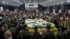 Supporters of Hizbullah mourn next to coffins during the funeral of the three people allegedly killed a day earlier by snipers, in the southern suburbs of Beirut, Lebanon on October 15th. Photograph: Nabil Mounzer/EPA