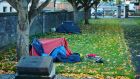 Homeless people’s tents in the park opposite Collins Barracks by the Luas line in Dublin. Photograph: Alan Betson