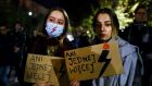 Young women in Krakow, Poland hold banners reading ‘Not one more’ during a protest after a 30-year-old woman died of septic shock in her 22nd week of pregnancy. Photograph:  Beata Zawrzel/NurPhoto via Getty Images