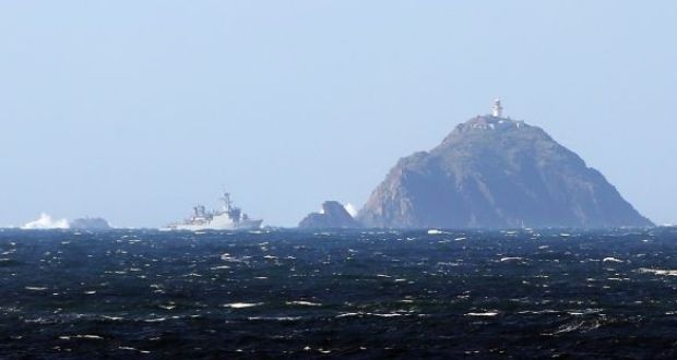 A Navy vessel off Blacksod Lighthouse in March 2017, where the search for Rescue 116 took place. Photograph: Colin Keegan/Collins Dublin