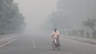  A cyclist endures the heavy smog in New Delhi    as the city’s s air quality reached  dangerous levels following  the Diwali festival. Photograph: Harish Tyagi/EPA 