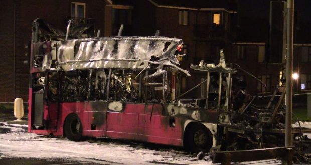 The burnt out double decker bus in Church Road near Rathcoole in Newtownabbey, Co Antrim, after it was hijacked and set on fire near a loyalist estate on the outskirts of Belfast. Photograph: David Young/PA Wire