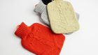 Knitted hot water bottle covers by Fisherman out of Ireland, available in the Irish Design Shop