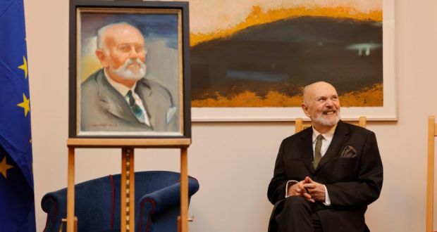  Senator David Norris beside  his portrait  by artist William Nathans. Photograph: Alan Betson