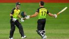  Marcus Stoinis (right) and Matthew Wade celebrate Australia’s victory over Pakistan in the Twenty20 World Cup semi-final at the Dubai International Cricket Stadium. Photograph: Indranil Mukherjee/AFP via Getty Images