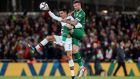 Ireland’s Shane Duffy challenges Portugal’s  Cristiano Ronaldo in the air during the World Cup qualifier at the Aviva Stadium. Photograph: Dan Sheridan/Inpho