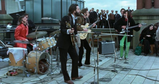 Get Back: Ringo Starr, Paul McCartney, John Lennon and George Harrison play on the roof of their London building. Photograph: Disney+/Apple Corps