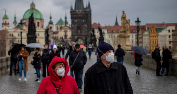 Tourists wearing face masks walk on Charles Bridge in Prague, Czech Republic on November 5th. Photograph: Martin Divisek/EPA