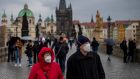 Tourists wearing face masks walk on Charles Bridge in Prague, Czech Republic on November 5th. Photograph: Martin Divisek/EPA