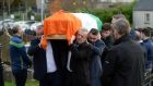 The coffin of civil rights leader Austin Currie is carried to his second funeral service at St Malachy’s Church in Edendork, Co Tyrone, before burial in the adjoining cemetery. Photograph: Oliver McVeigh/PA Wire