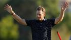 Denmark’s Joachim B Hansen  celebrates on the 18th green after the final round of the Aviv Dubai Championship at the  Fire Course. Photograph: Oisín Keniry/Getty Images