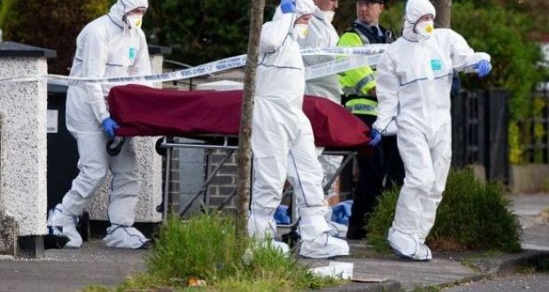 The body of Hamid Sanambar being removed from the scene of a shooting at Kilbarron Avenue, Coolock. Photograph: Tom Honan