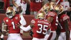 Jimmie Ward  of the San Francisco 49ers celebrates his pick six with teammates during the first half against the Los Angeles Rams. Photograph:  Ezra Shaw/Getty Images
