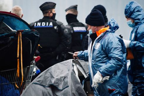 MIGRANT CAMP: Police forces cut tents as migrants are evacuated from a camp in Grande-Synthe, France on Tuesday. French police were evacuating migrants from a makeshift camp near Dunkirk, in northern France, where at least 1,500 people gathered in hopes of making it across the English Channel to Britain. Migrants, including some families with young children, could be seen packing their few belongings as police were encircling the camp, on the site of a former industrial complex in Grande-Synthe, east of Dunkirk. Photograph: Louis Witter/AP