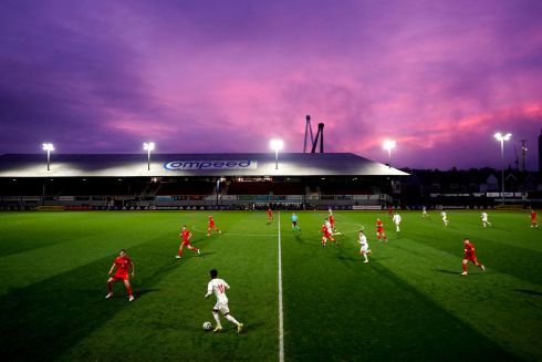 MATCH SUNSET: The sun sets over the UEFA Euro U21 Qualifying Group E match at Rodney Parade, Newport. Photograph: Zac Goodwin/PA Wire