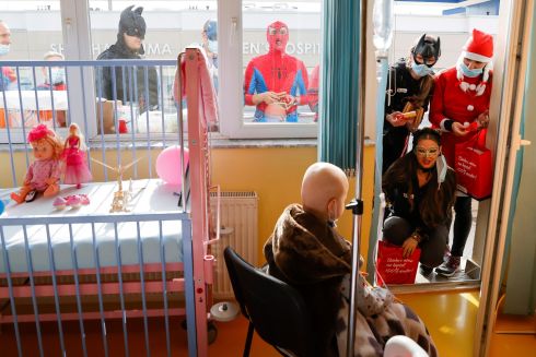 SUPERHERO VISIT: People from the Care for Kosovo Kids Foundation and the Alpin Prishtina Club dress as superheroes to visit children at the paediatric clinic in Pristina, Kosovo. Care for Kosovo Kids Foundation has provided medicine for children who are treated for cancer in the oncology ward since 2013. Photograph: Valdrin Xhemaj/EPA