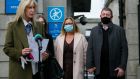 Solicitor  Gillian O’Connor with Deirdre and Adrian Molloy outside the High Court on Wednesday after Oran Molloy settled his birth injury case for € 30 million. Photograph: Collins Courts