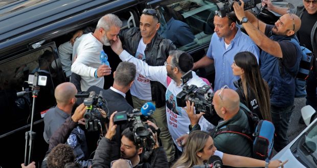 Israeli couple Mordi and Natalie Oknin are greeted upon their arrival home following their detention in Turkey on suspicion of espionage. Photograph: Gil Cohen-Magen/ AFP via Getty 